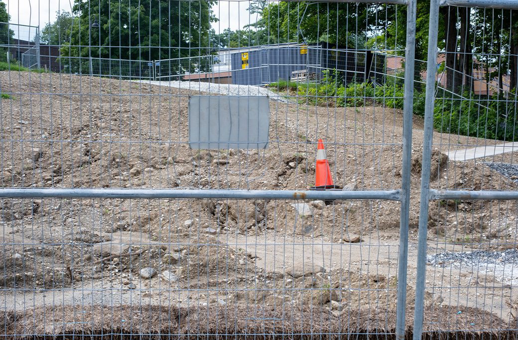 Temporary fencing panels installed around a construction site