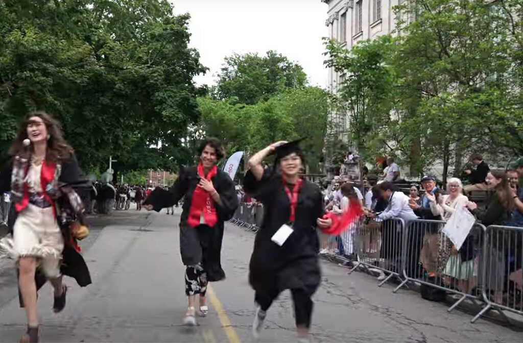 Pedestrian barricades directing foot traffic at an outdoor event